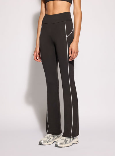 Leggings sportivi lunghi a zampa con piping