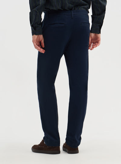 Pantaloni chinos sartoriali con piega
