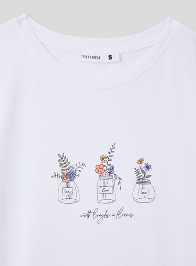 Camiseta slim fit con estampado de flores