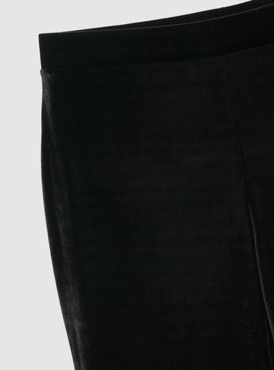 Pantaloni a zampa in velluto a tinta unita