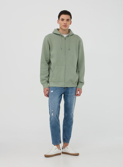 Jeans relaxed con piccoli strappi