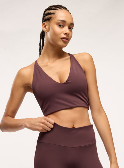 Bra top sportivo tinta unita con scollo a V