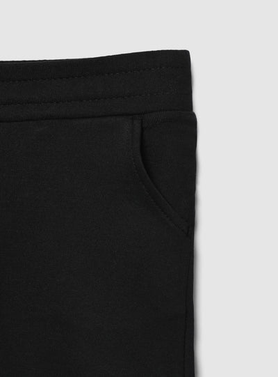 Pantaloni tuta lunghi con elastico e polsini