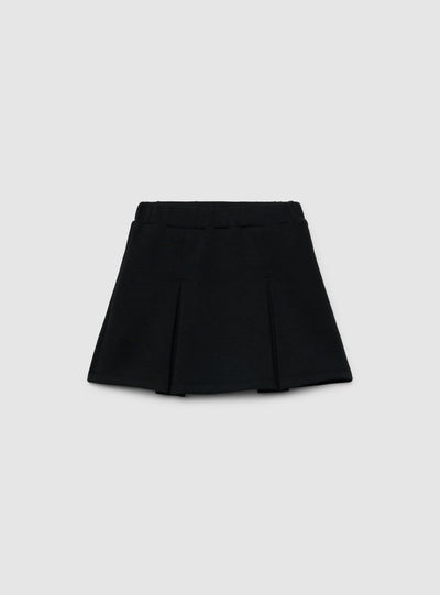 Skort da bambina con pieghe a tinta unita