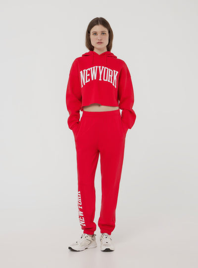 Felpa crop con cappuccio e stampa New York