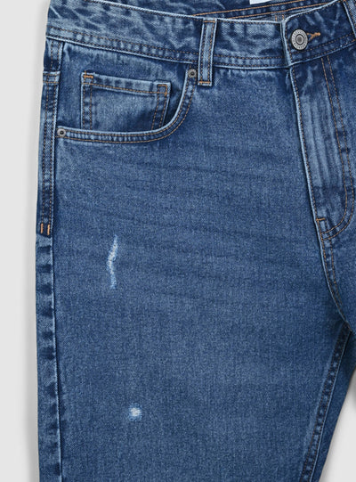 Loose fit jeans with small rips