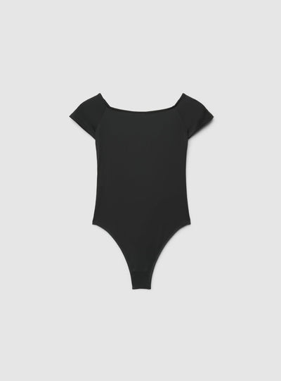 Body a spalle scoperte con scritta