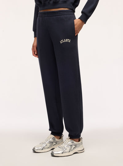 Pantaloni tuta vita alta con scritta college