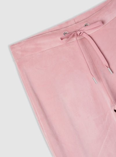 Pantaloni tuta a zampa ciniglia tinta unita