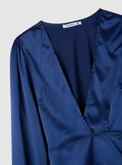 Blusa in satin con scollo a V