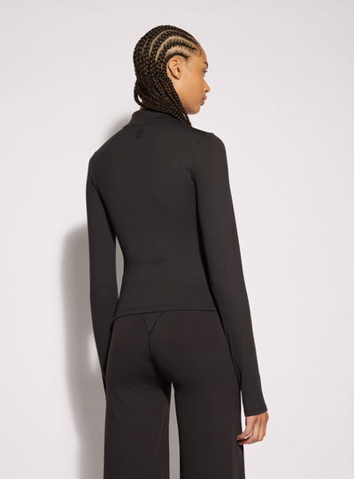 T-shirt sportiva con mezza zip