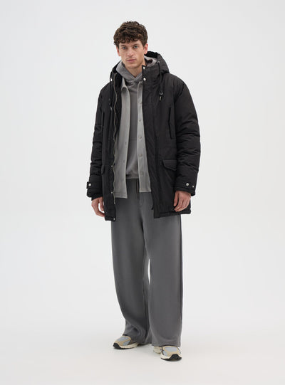 Parka imbottito con cappuccio e interno sherpa