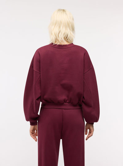 Pantaloni tuta wide leg con bande laterali