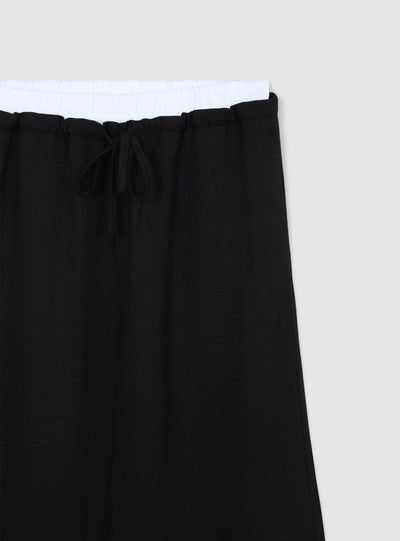 Pantaloni wide leg con vita a contrasto