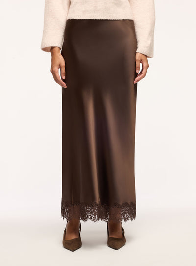 Gonna lunga svasata in satin con bordo in pizzo