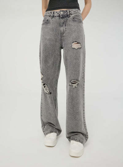 Jeans wide leg con strappi ampi