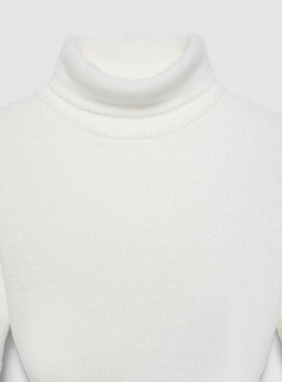 Maglia crop dolcevita a tinta unita