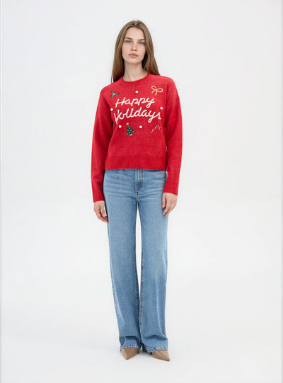 Pull large avec inscription de Noël et patch