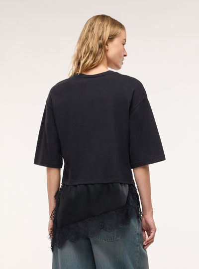 T-shirt con fondo asimmetrico e inserti in pizzo