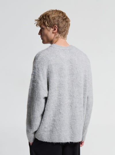 Boxy Pullover mit flauschiger Oberfläche und Schriftzug