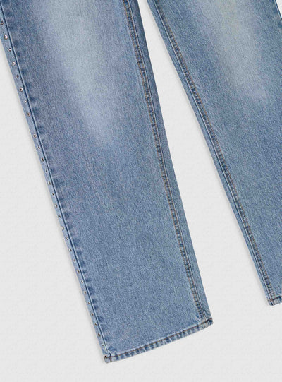 Jeans wide leg con borchie laterali