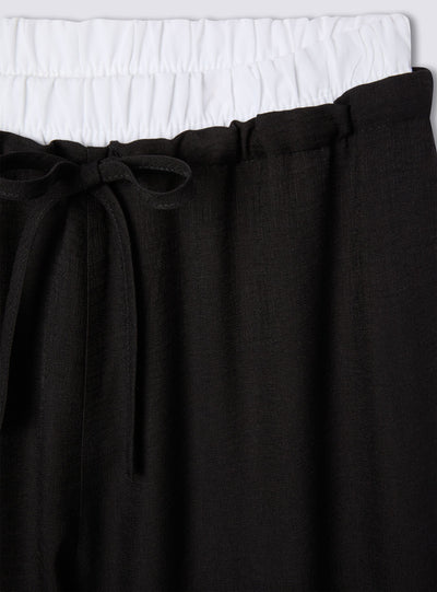 Pantaloni wide leg con vita a contrasto