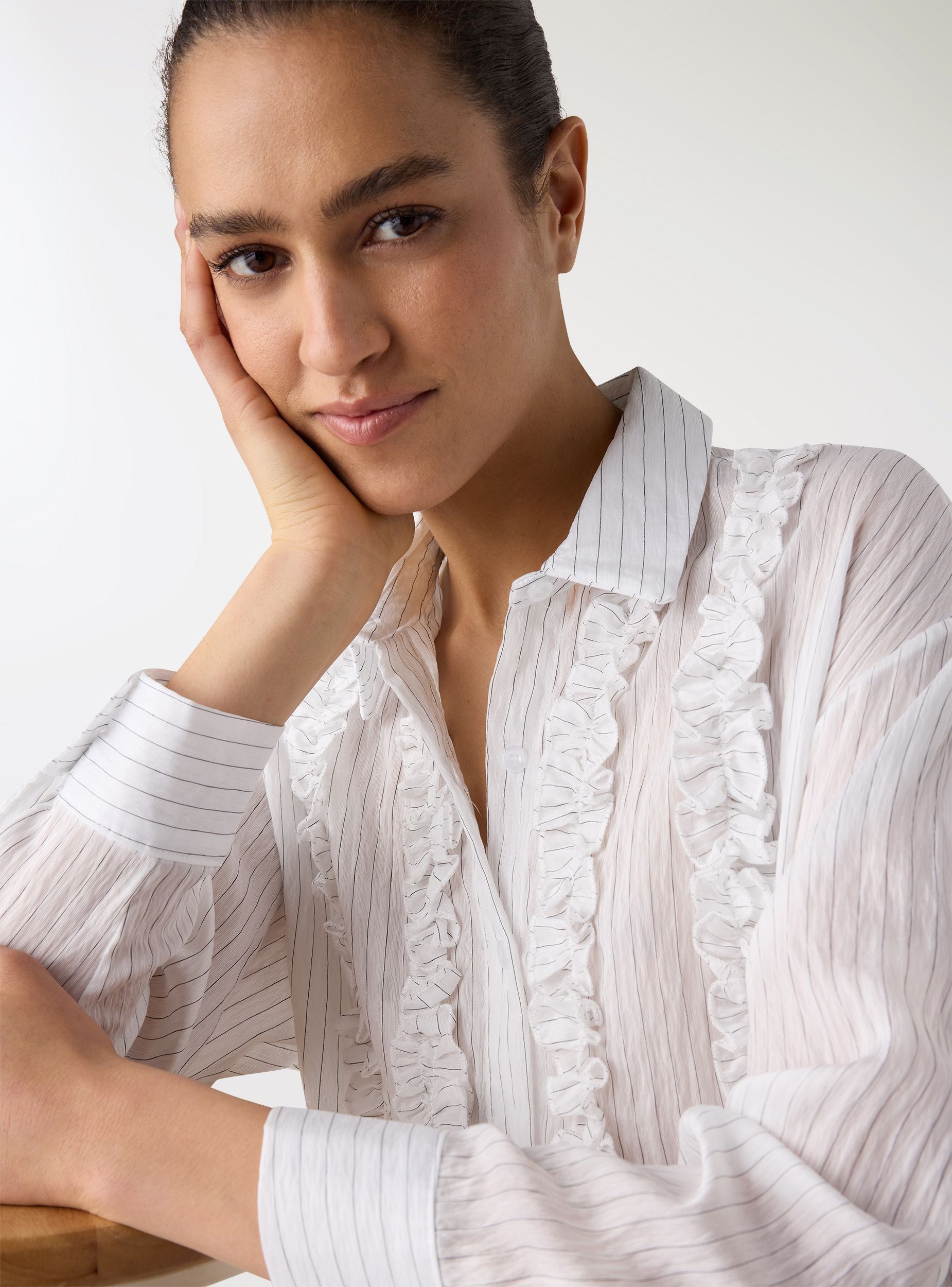 Striped shirt with ruffles and knot Striped shirt with ruffles and knot