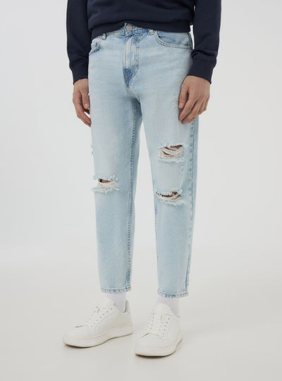 Light loose-fit jeans with rips