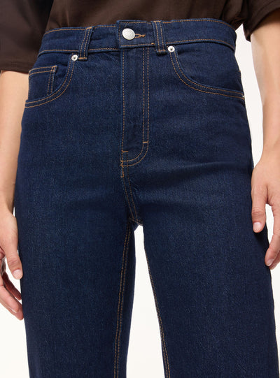 Jeans bootcut a tinta unita