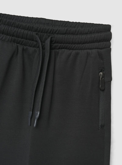 Pantaloni tuta jogger con zip e coulisse