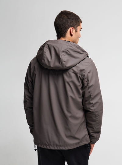 Giacca a vento con cappuccio e zip
