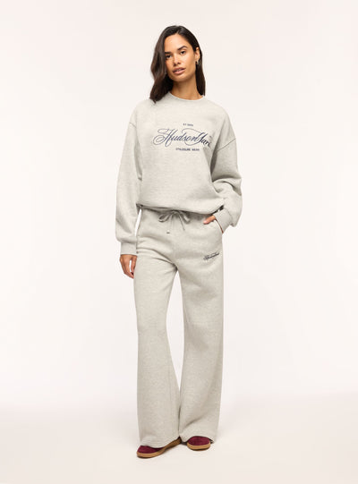 Pantaloni tuta wide leg con ricamo college