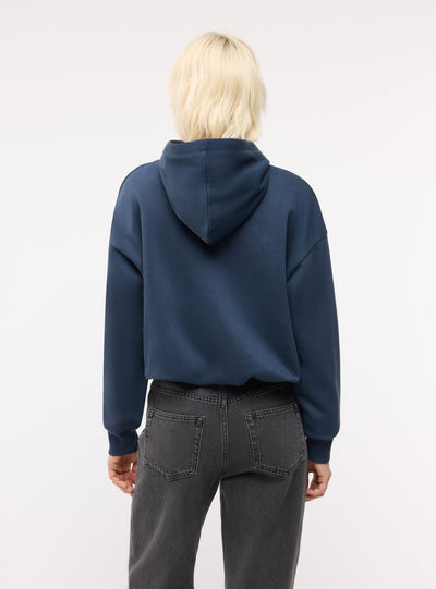 Felpa crop con cappuccio e scritta