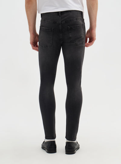 Jeans skinny a tinta unita