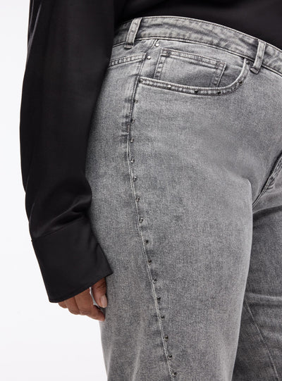 Jeans wide leg con borchie