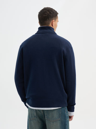 Maglia con collo alto e mezza zip