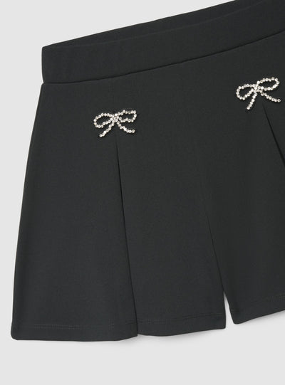 Shorts con fiocchi strass