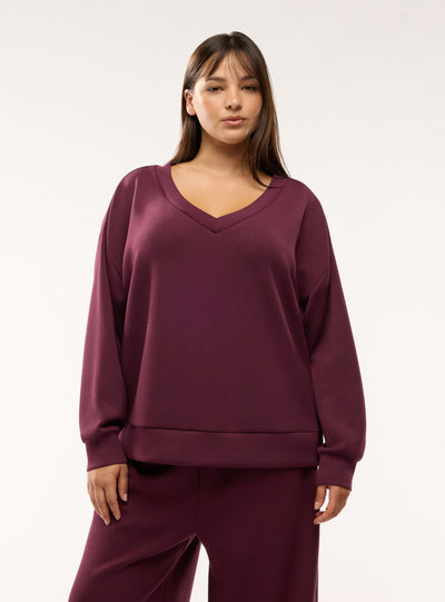 Felpa oversize con scollo a v