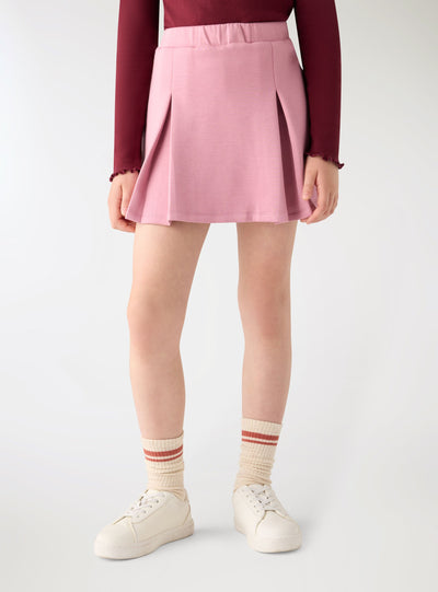 Skort da bambina con pieghe a tinta unita