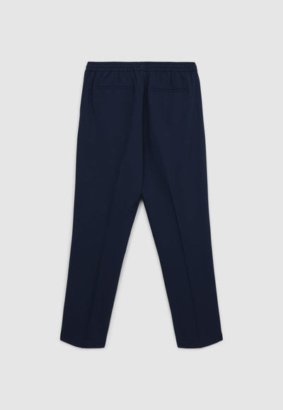 Pantaloni con elastico in vita e coulisse tinta unita