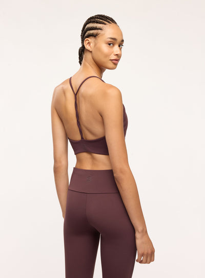Bra top sportivo tinta unita con scollo a V