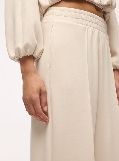Pantaloni tuta wide leg a tinta unita