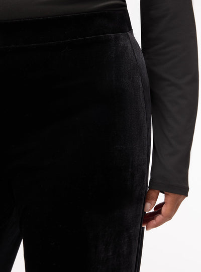 Pantaloni a zampa in velluto a tinta unita