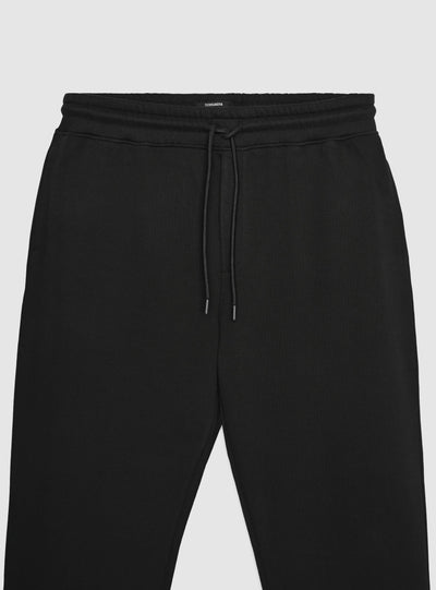 Pantaloni tuta relaxed a tinta unita