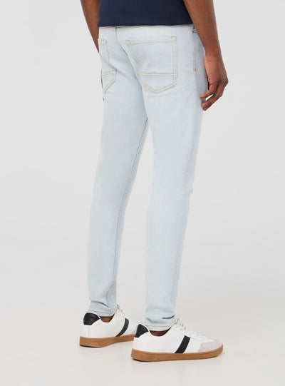Light skinny jeans with rips