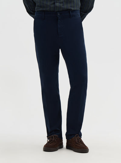 Pantaloni chinos sartoriali con piega