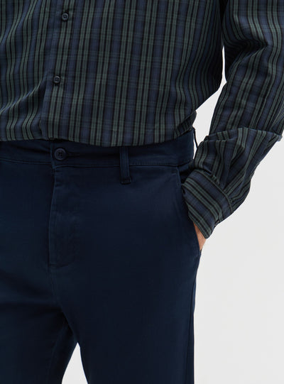 Pantaloni chinos sartoriali con piega