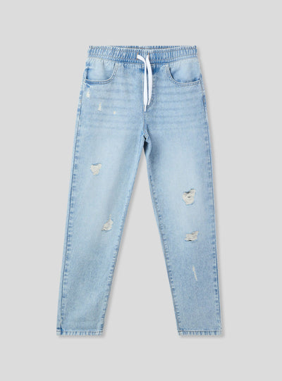 Jogger in denim con strappi e coulisse