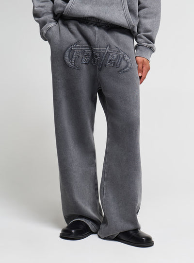 Pantaloni tuta maxi wide leg con stampa e patch