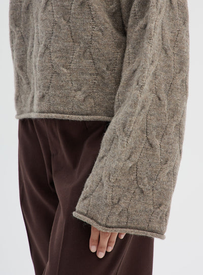 Maglia con collo lupetto a trecce